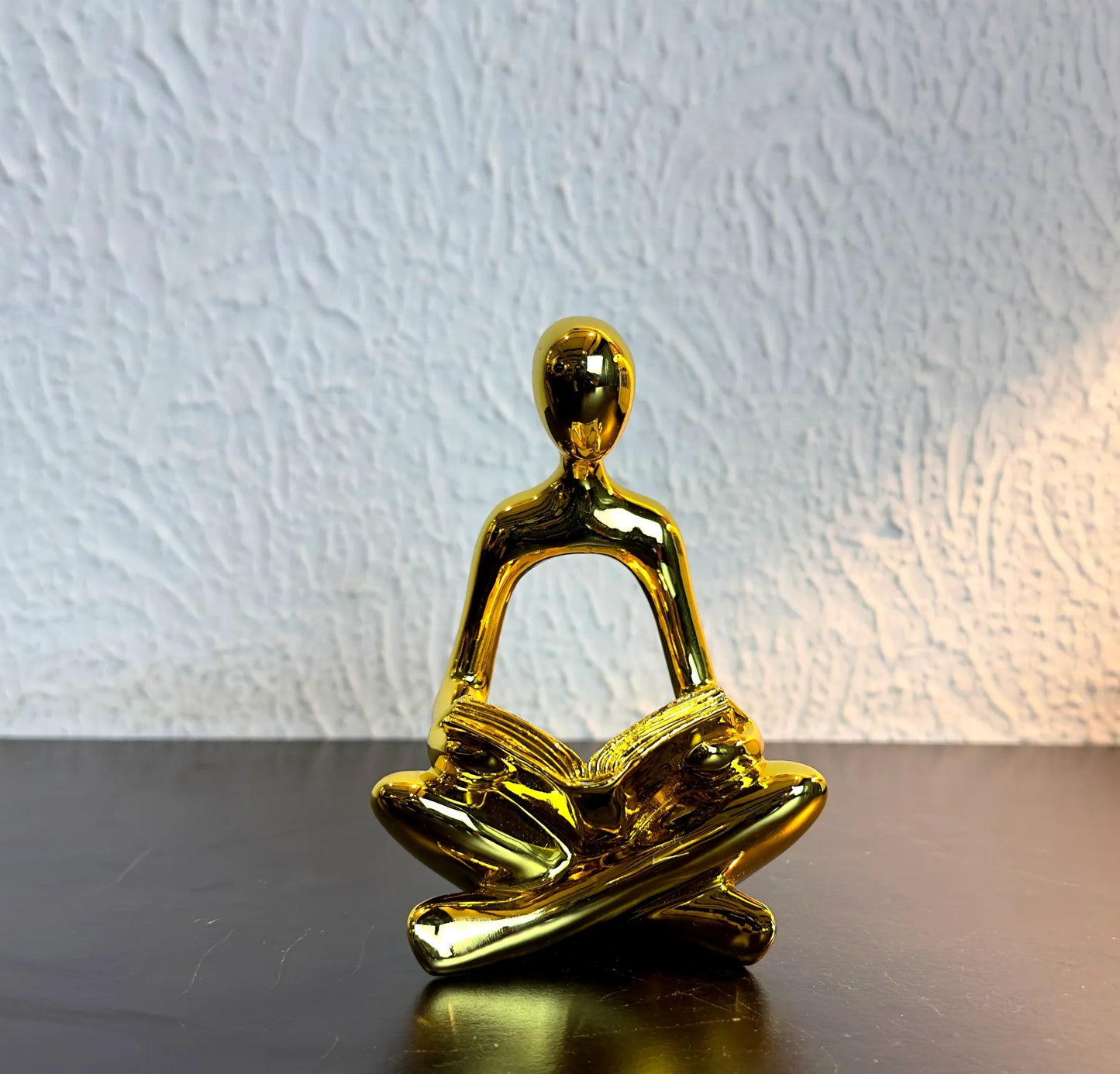 
                  
                    Gold Reading Sculpture
                  
                